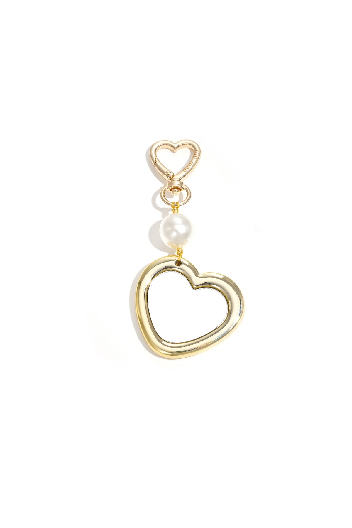 Boucles d'oreilles en forme de cœur serties de pierres